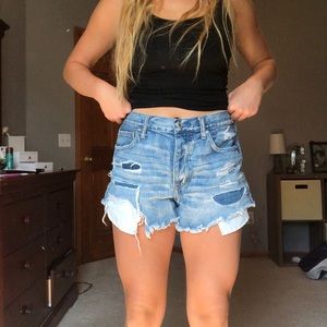 festival distressed and patched shorts